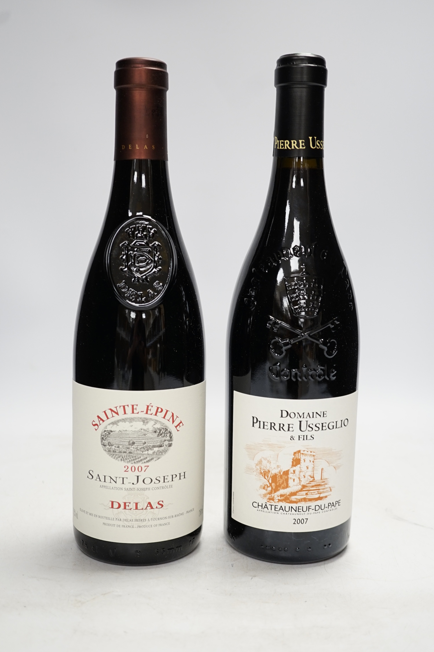 Twelve bottles of wine to include six bottles of Domaine Pierre Usseglio & Fils Châteauneuf du Pape 2007, and six bottles of Sainte-Epinephrine Saint-Joseph 2007. Condition - good, storage history unknown.